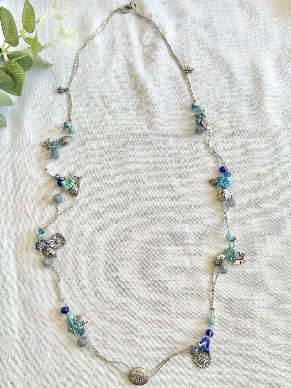 Handcrafted silver-toned blue beaded summer charm necklace